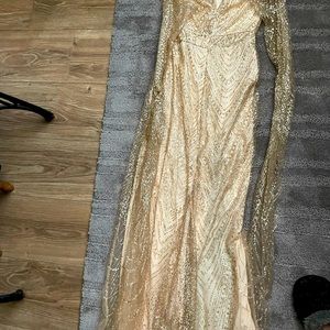 Gold sparklingly long dress. Strapless.  .  Lined.